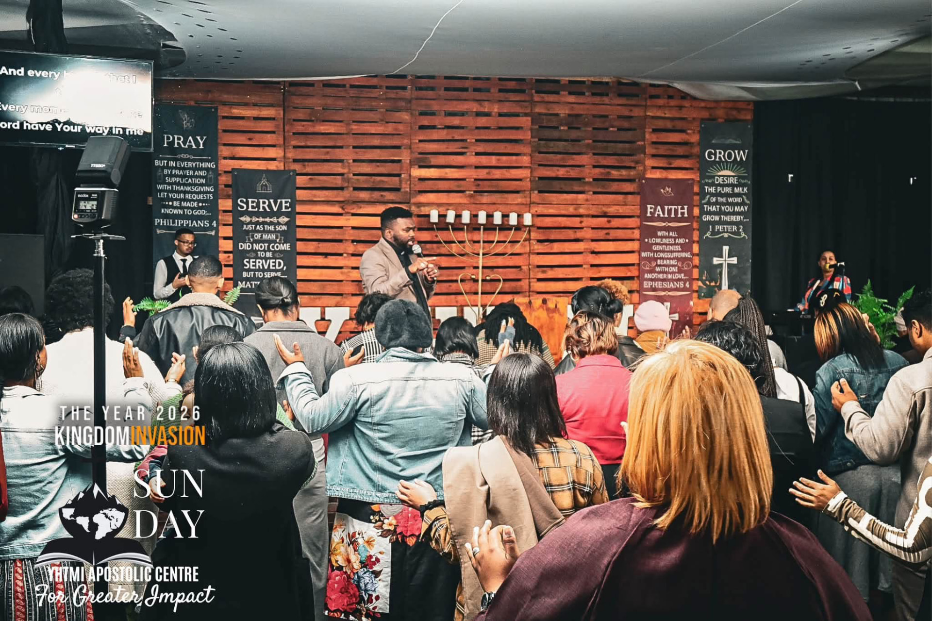 YHTMI congregation worshipping during a Sunday service